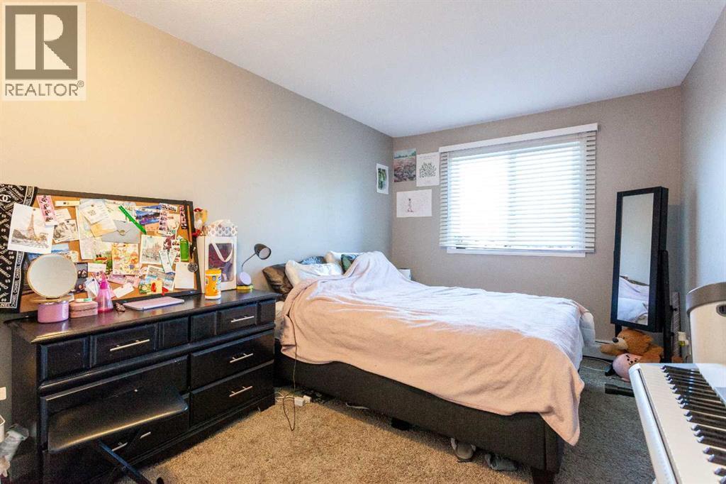 207B, 295 Columbia Boulevard W, Lethbridge, AB - Indoor Photo Showing Bedroom