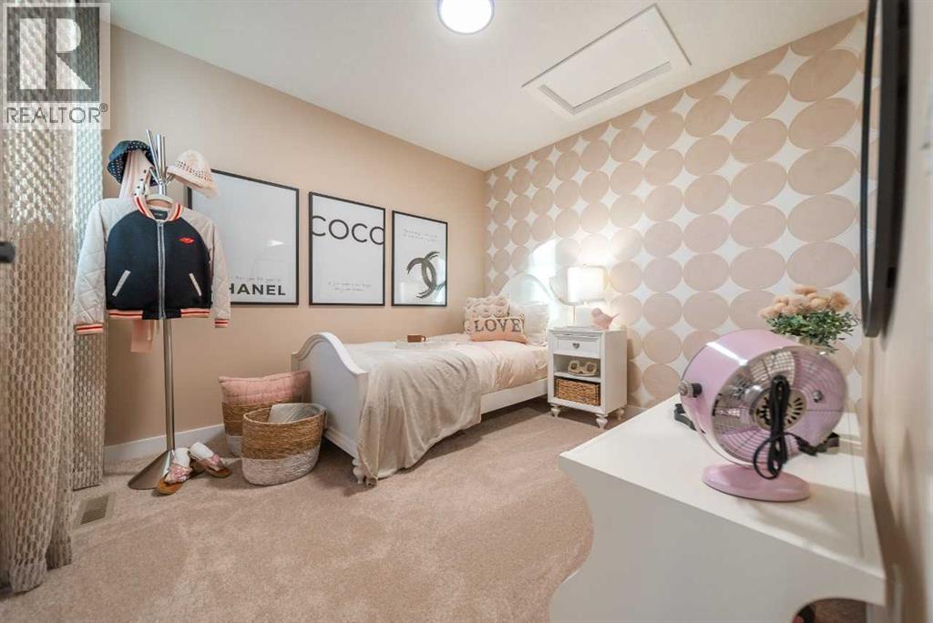 132 Southbow Village Way, Cochrane, AB - Indoor Photo Showing Bedroom