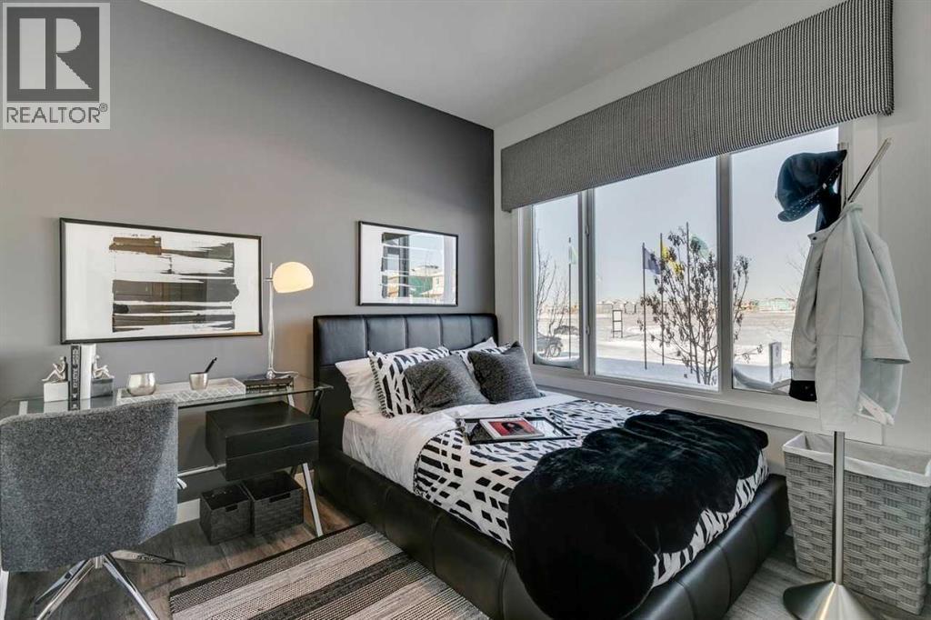 499 Lawthorn Way Se, Airdrie, AB - Indoor Photo Showing Bedroom