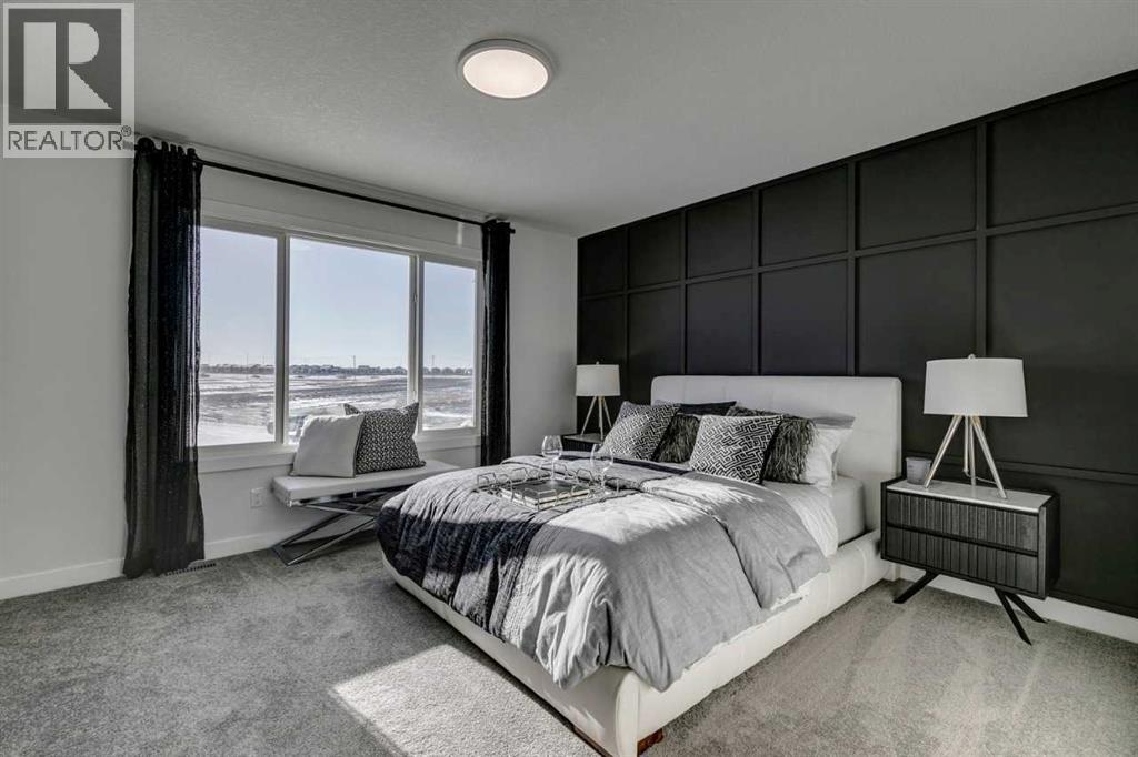 499 Lawthorn Way Se, Airdrie, AB - Indoor Photo Showing Bedroom