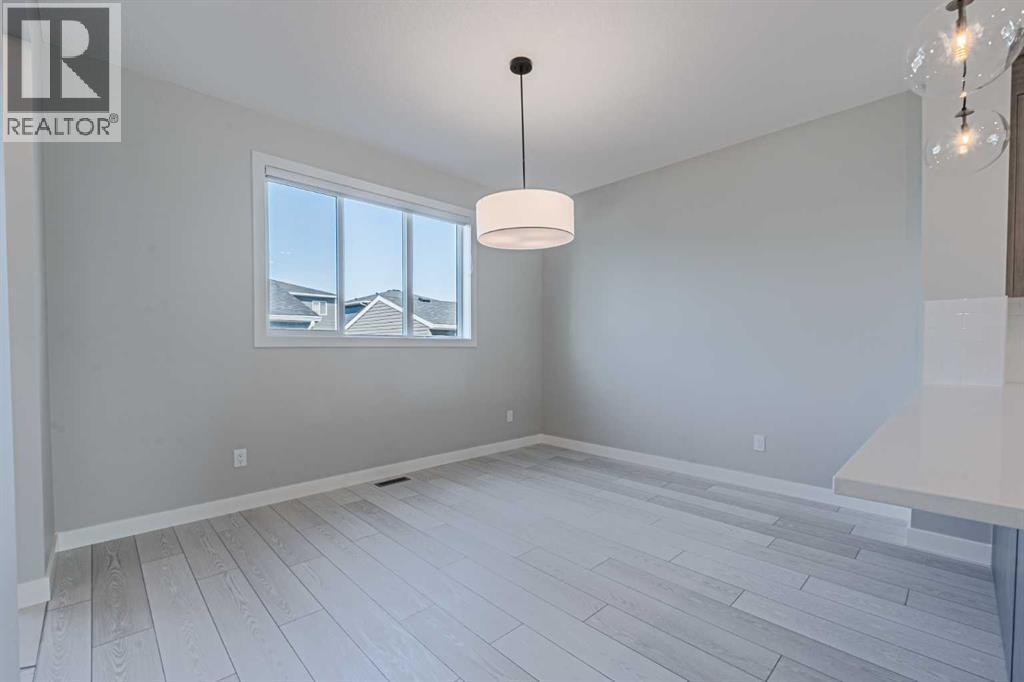 129 Dawson Wharf View, Chestermere, AB - Indoor Photo Showing Other Room