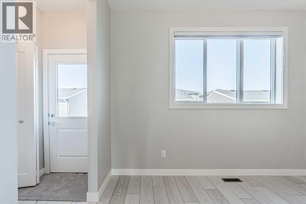 129 Dawson Wharf View, Chestermere, AB - Indoor Photo Showing Other Room