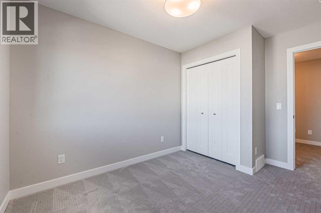 129 Dawson Wharf View, Chestermere, AB - Indoor Photo Showing Other Room