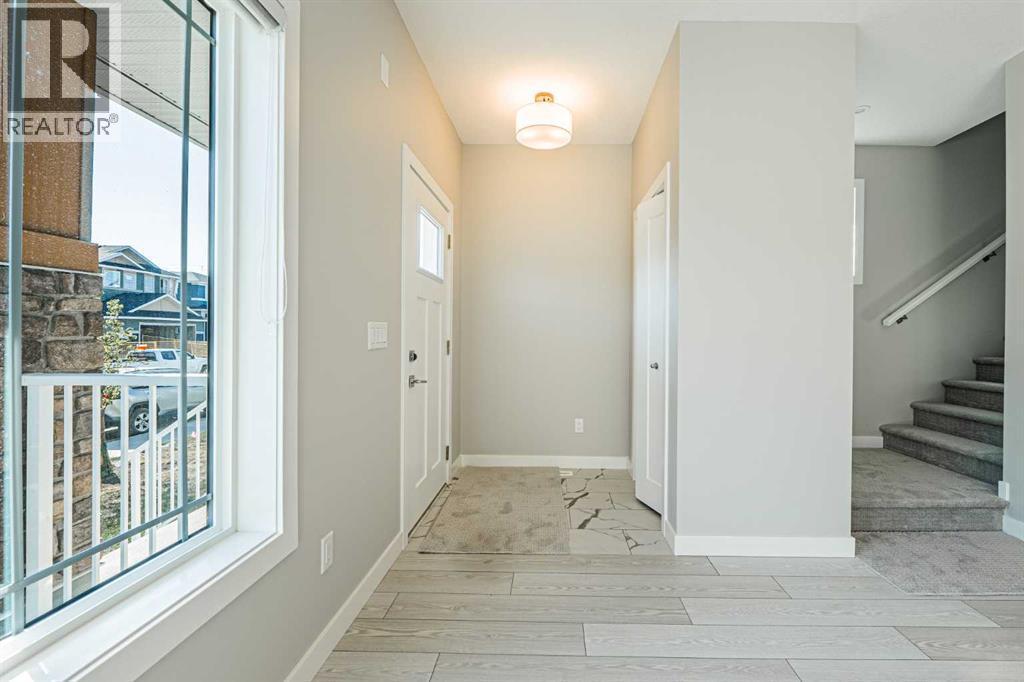 129 Dawson Wharf View, Chestermere, AB - Indoor Photo Showing Other Room