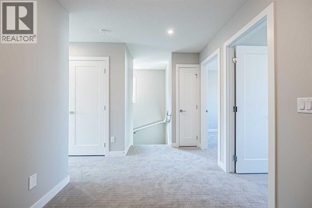 129 Dawson Wharf View, Chestermere, AB - Indoor Photo Showing Other Room