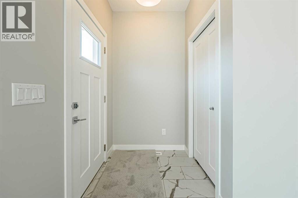 129 Dawson Wharf View, Chestermere, AB - Indoor Photo Showing Other Room