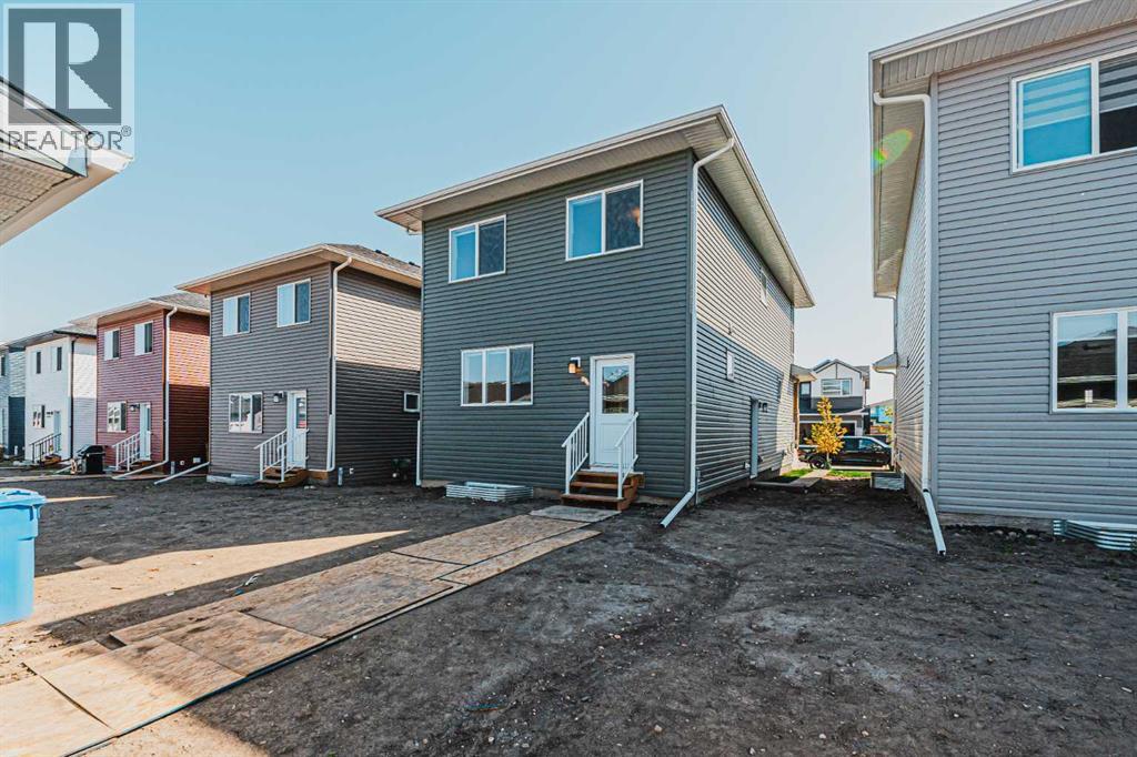 129 Dawson Wharf View, Chestermere, AB - Outdoor With Exterior