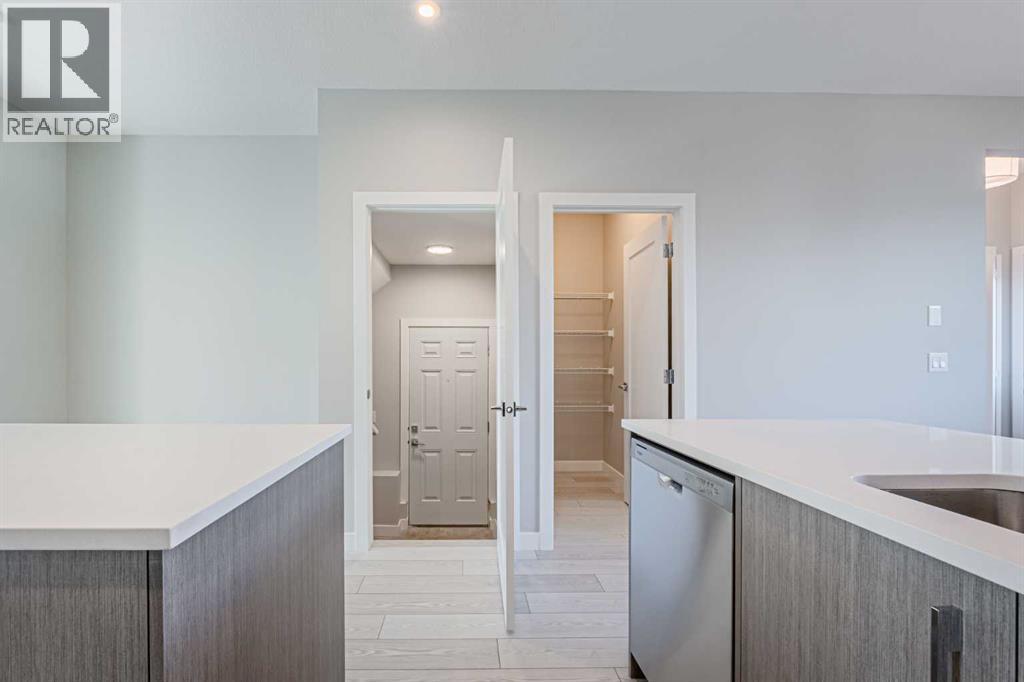129 Dawson Wharf View, Chestermere, AB - Indoor Photo Showing Kitchen