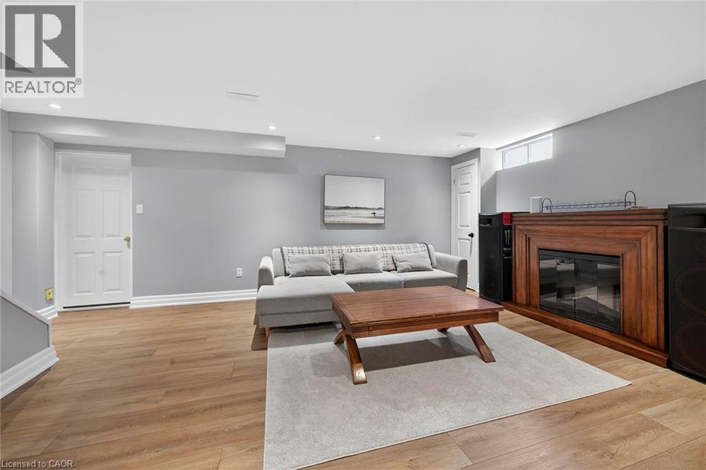 28 Buchanan Drive, Caledonia, ON - Indoor Photo Showing Living Room With Fireplace