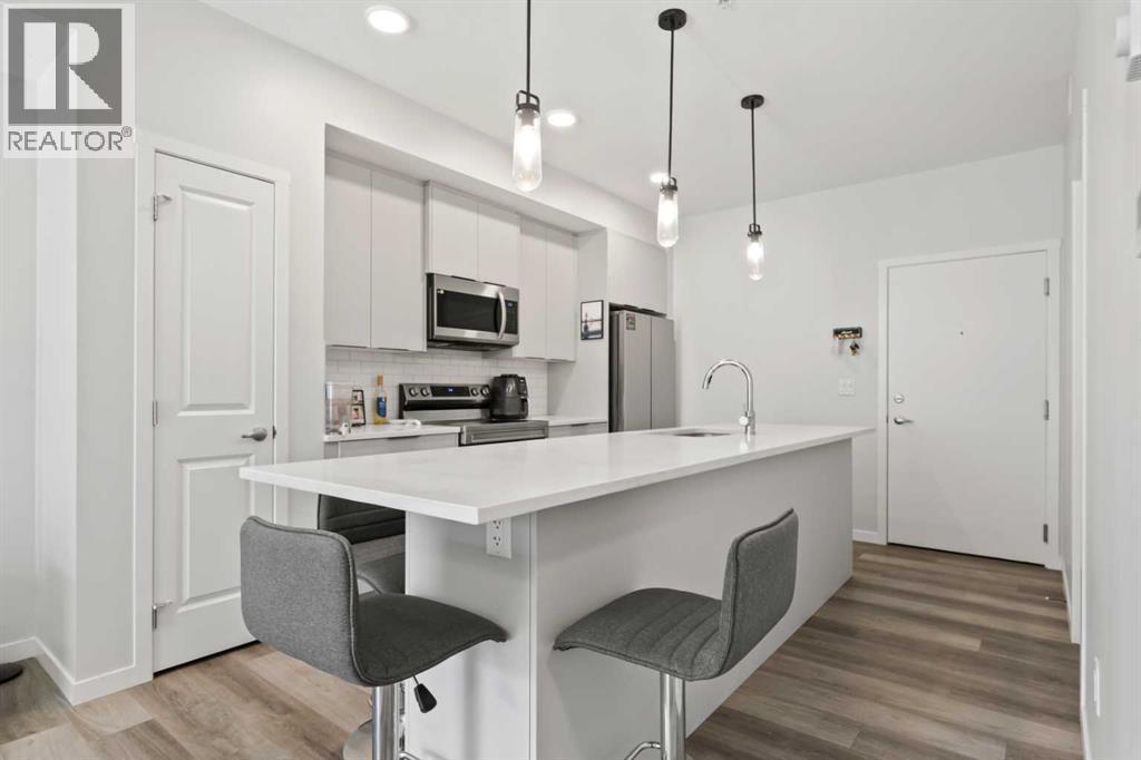 1104, 220 Seton Grove Se, Calgary, AB - Indoor Photo Showing Kitchen With Upgraded Kitchen