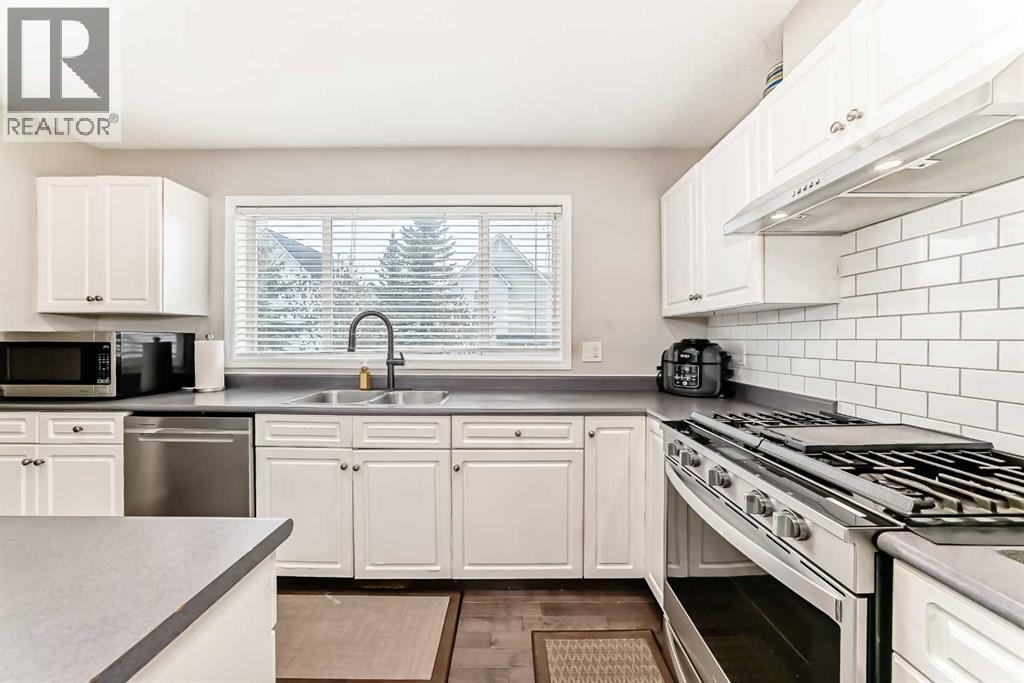 271 Prestwick Acres Lane Se, Calgary, AB - Indoor Photo Showing Kitchen With Double Sink