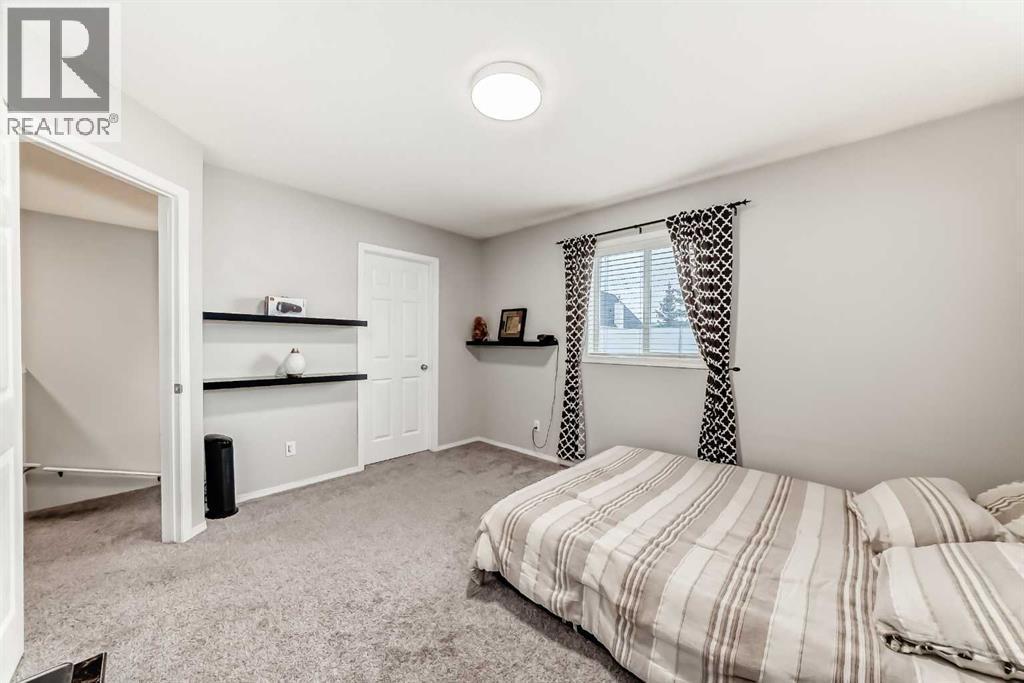 271 Prestwick Acres Lane Se, Calgary, AB - Indoor Photo Showing Bedroom