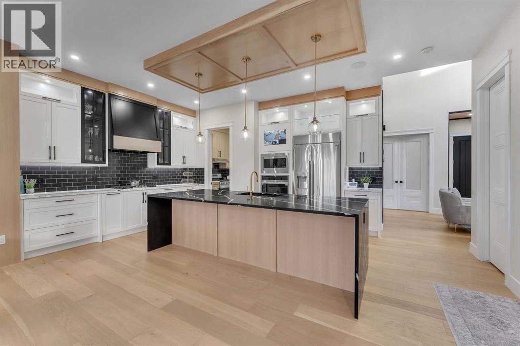 2012 Waterbury Road, Chestermere, AB - Indoor Photo Showing Kitchen With Upgraded Kitchen