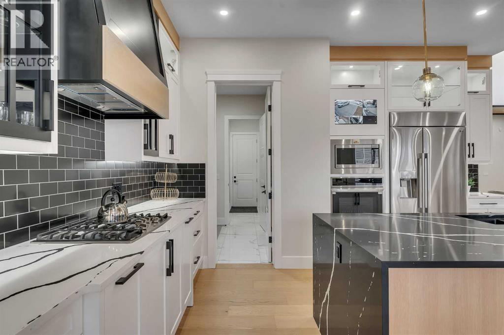 2012 Waterbury Road, Chestermere, AB - Indoor Photo Showing Kitchen With Upgraded Kitchen