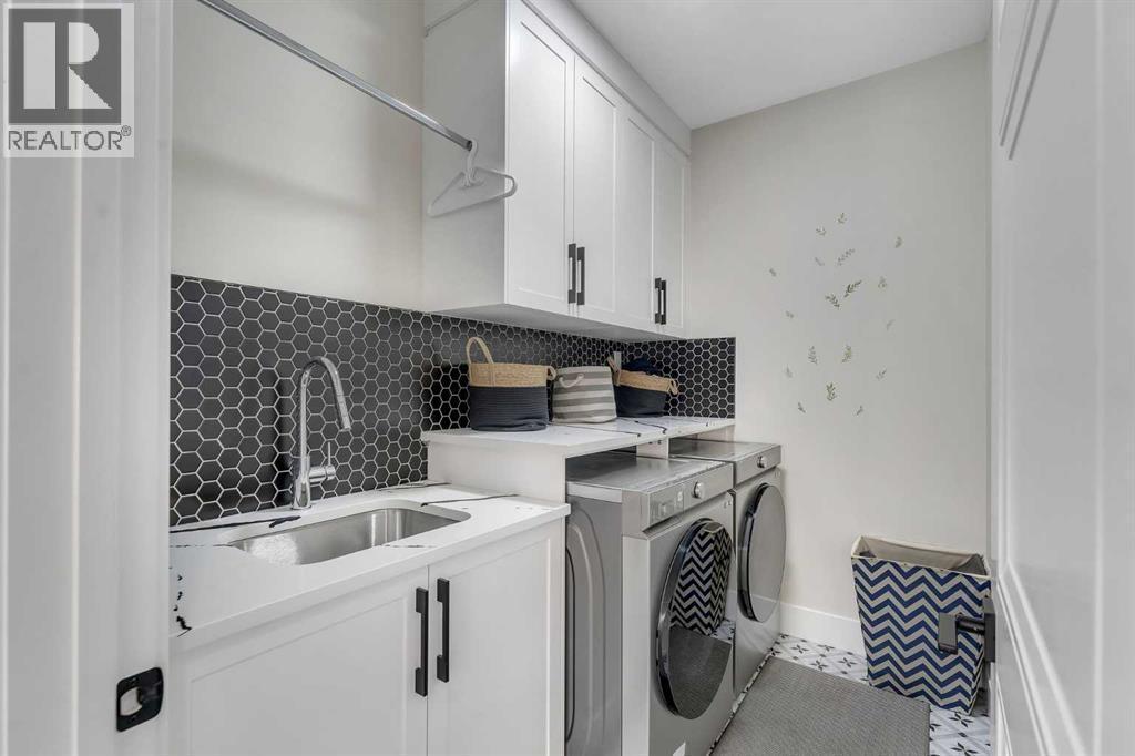 2012 Waterbury Road, Chestermere, AB - Indoor Photo Showing Laundry Room