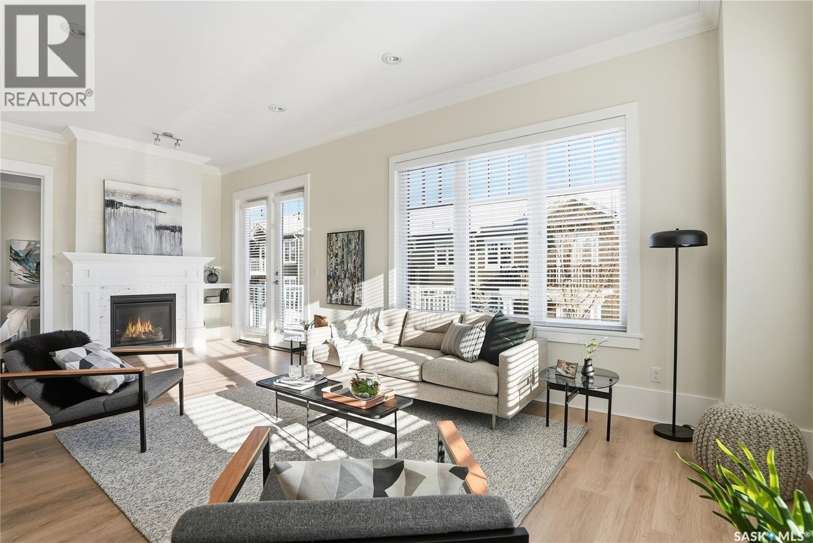 32 115 Meadows Boulevard, Saskatoon, SK - Indoor Photo Showing Living Room With Fireplace
