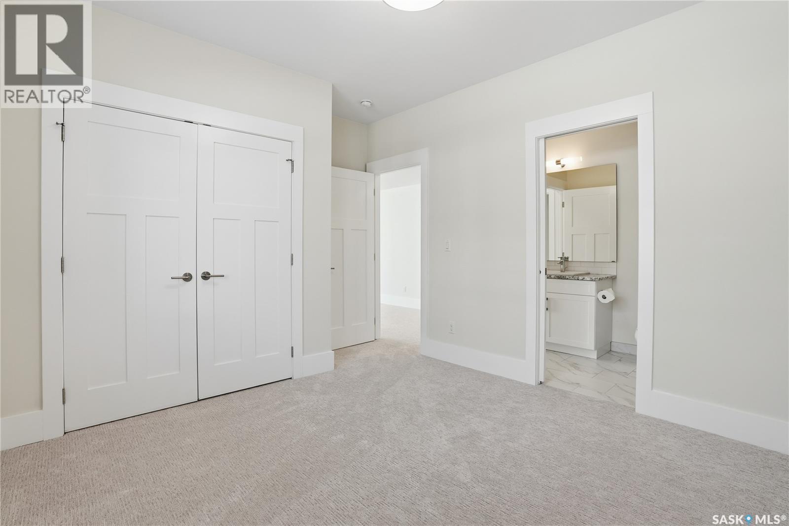 32 115 Meadows Boulevard, Saskatoon, SK - Indoor Photo Showing Other Room