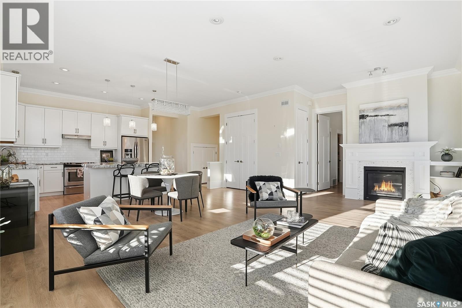 32 115 Meadows Boulevard, Saskatoon, SK - Indoor Photo Showing Living Room With Fireplace