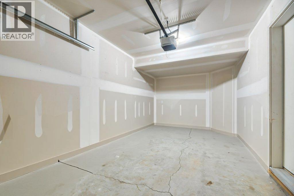 15 Copperpond Close Se, Calgary, AB - Indoor Photo Showing Other Room