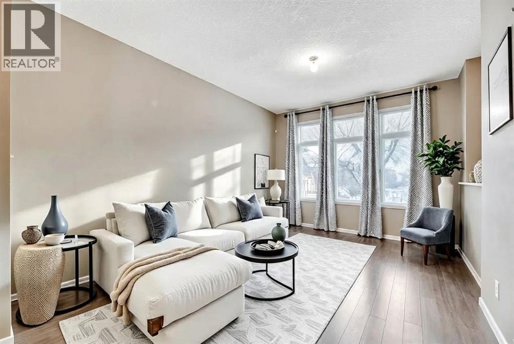 15 Copperpond Close Se, Calgary, AB - Indoor Photo Showing Living Room