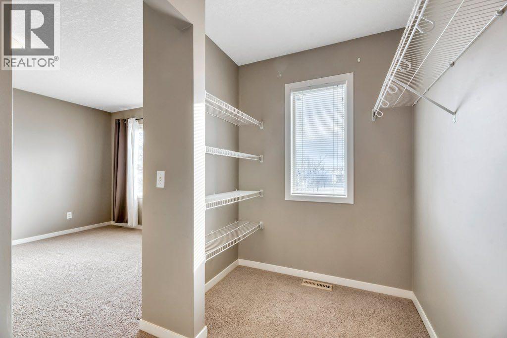 15 Copperpond Close Se, Calgary, AB - Indoor Photo Showing Other Room