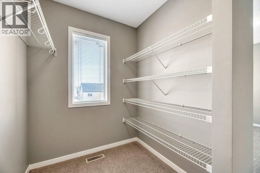 15 Copperpond Close Se, Calgary, AB - Indoor With Storage