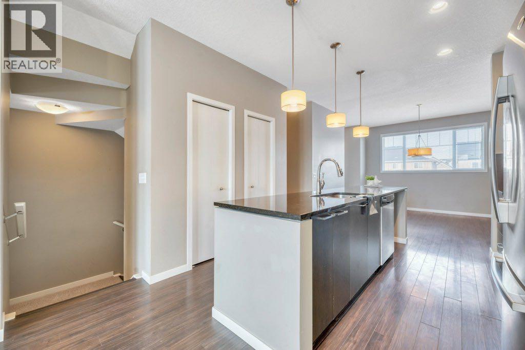 15 Copperpond Close Se, Calgary, AB - Indoor Photo Showing Kitchen With Stainless Steel Kitchen With Upgraded Kitchen