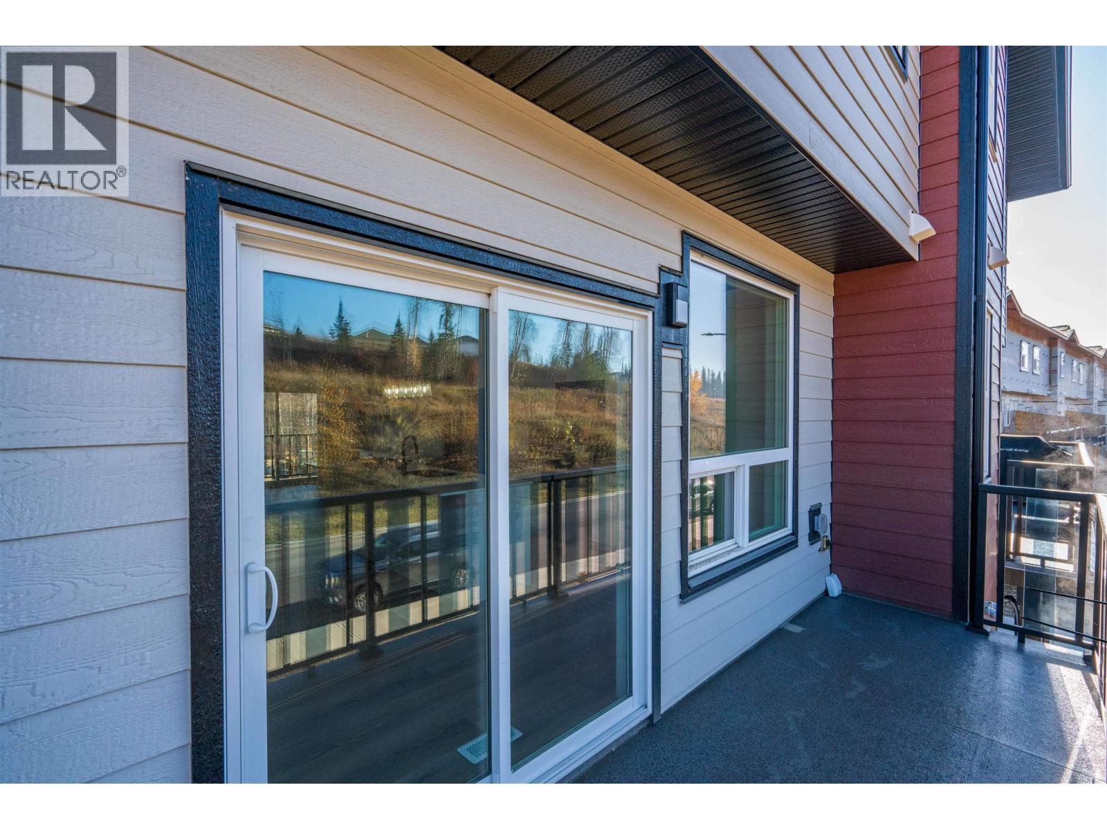 406 7000 Husband Drive, Prince George, BC - Outdoor With Deck Patio Veranda With Exterior