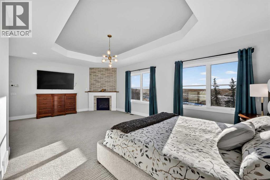 402017 23 Street W, Rural Foothills County, AB - Indoor Photo Showing Bedroom