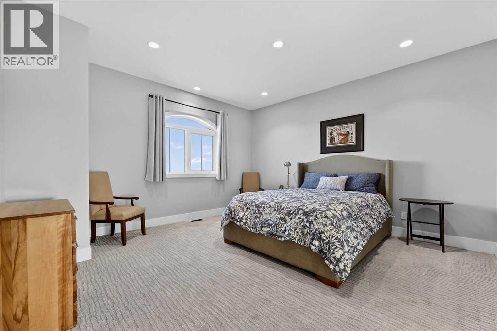 402017 23 Street W, Rural Foothills County, AB - Indoor Photo Showing Bedroom