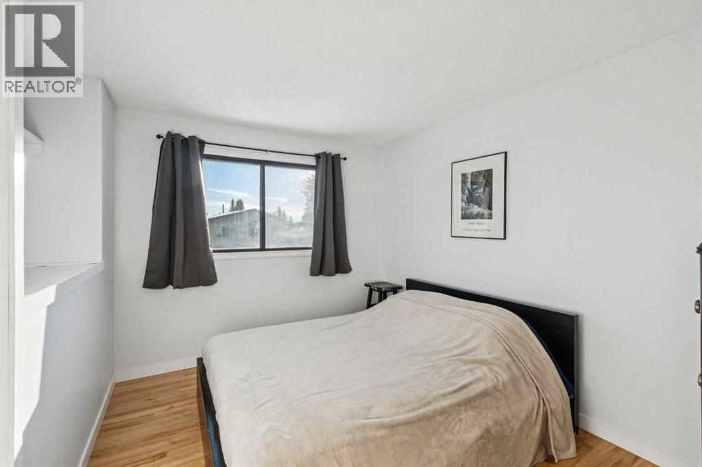 Bedroom #2 - 14 Glenhill Crescent, Cochrane, AB - Indoor Photo Showing Bedroom