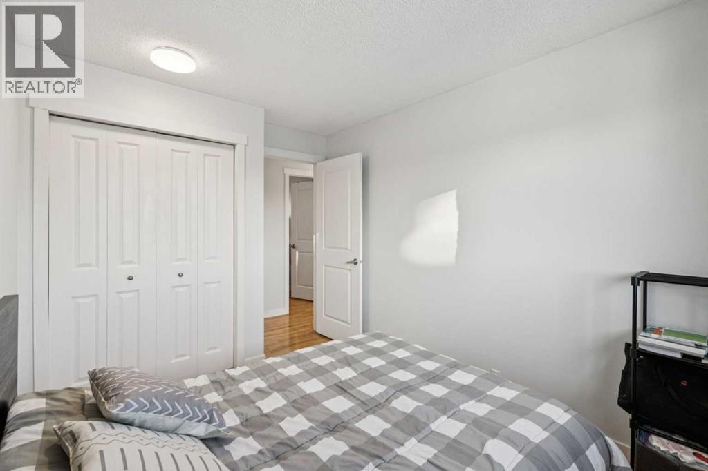 14 Glenhill Crescent, Cochrane, AB - Indoor Photo Showing Bedroom