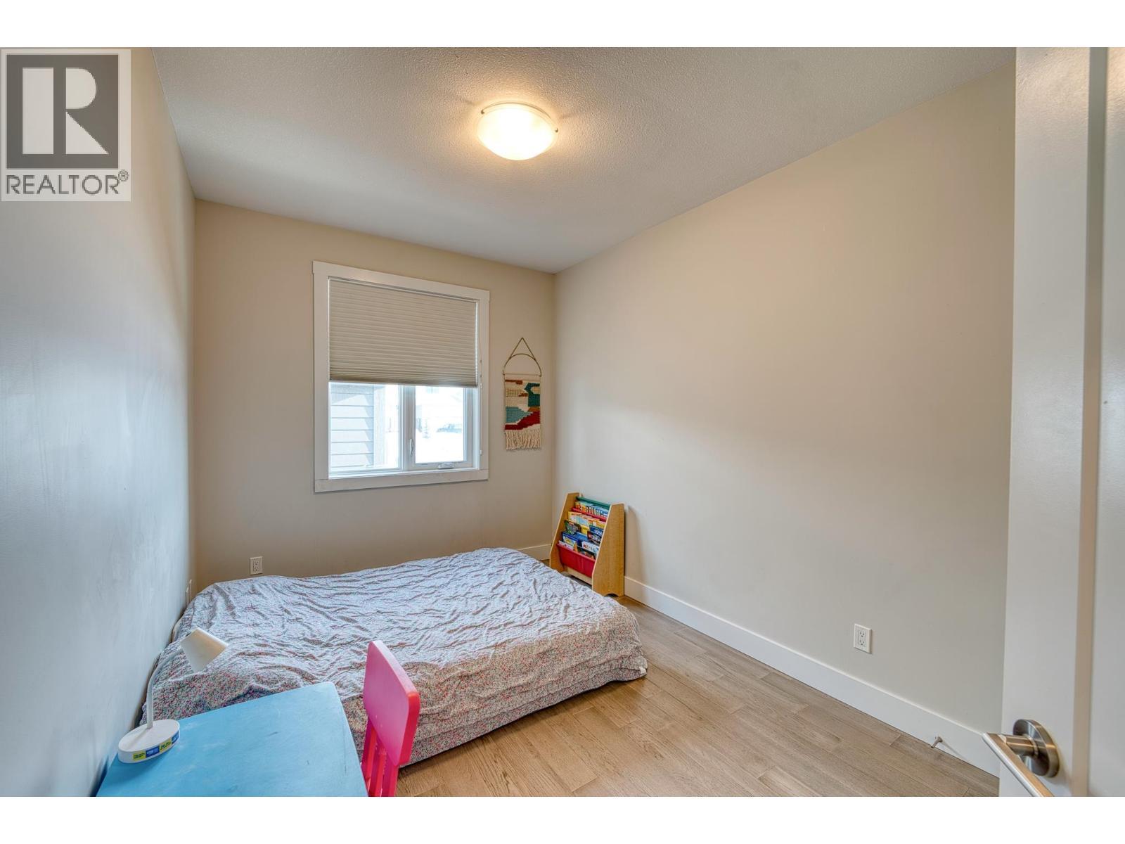 11112 115 Avenue, Fort St. John, BC - Indoor Photo Showing Bedroom
