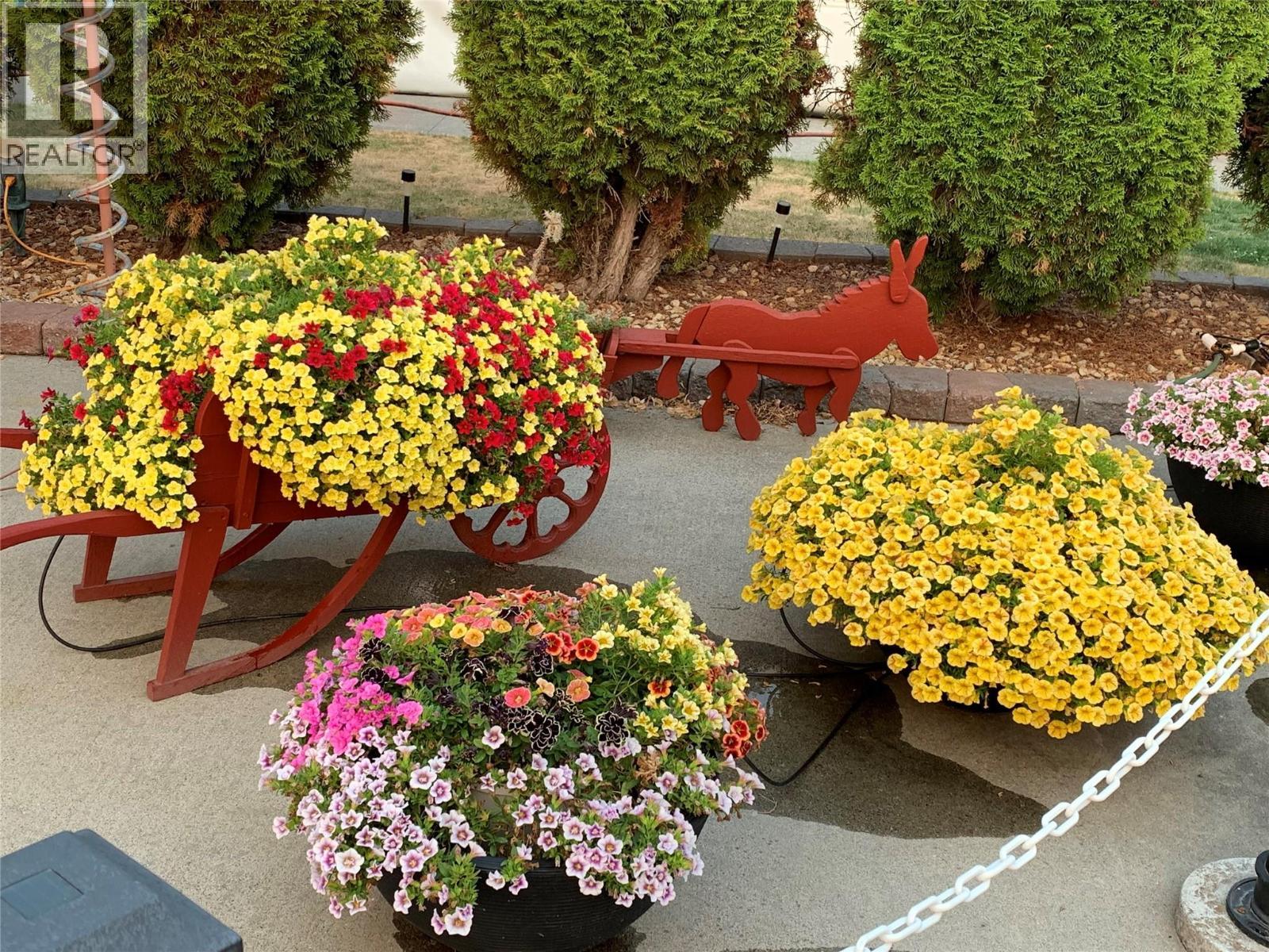 Summer gardens flourish here! - 8000 Highland Road Unit# 42, Vernon, BC