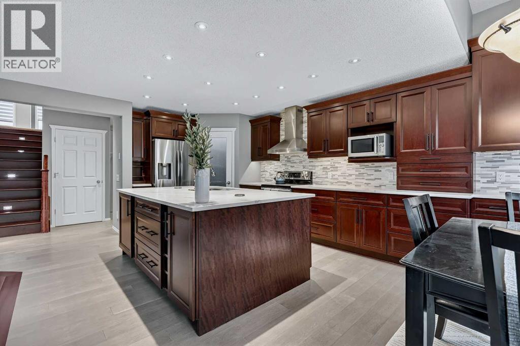 92 Panamount Green Nw, Calgary, AB - Indoor Photo Showing Kitchen With Upgraded Kitchen