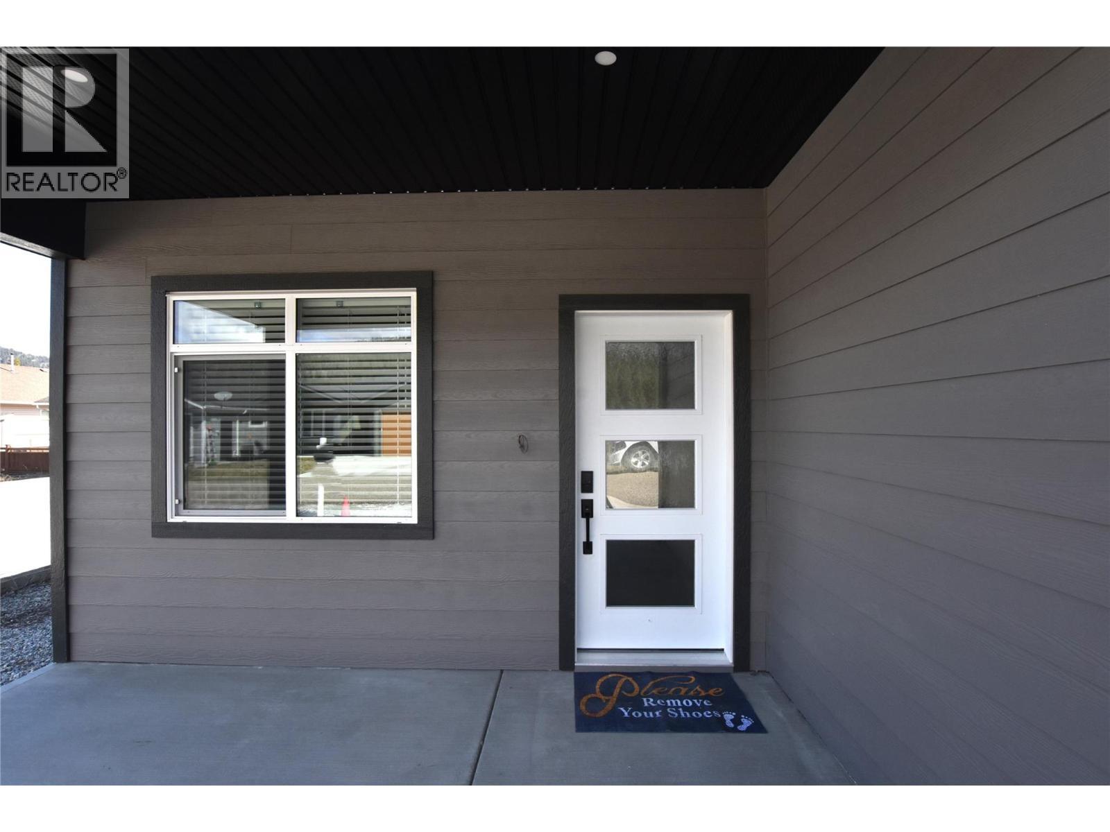 covered entrance. Lets go inside - 592 Nighthawk Avenue, Vernon, BC - Outdoor With Exterior