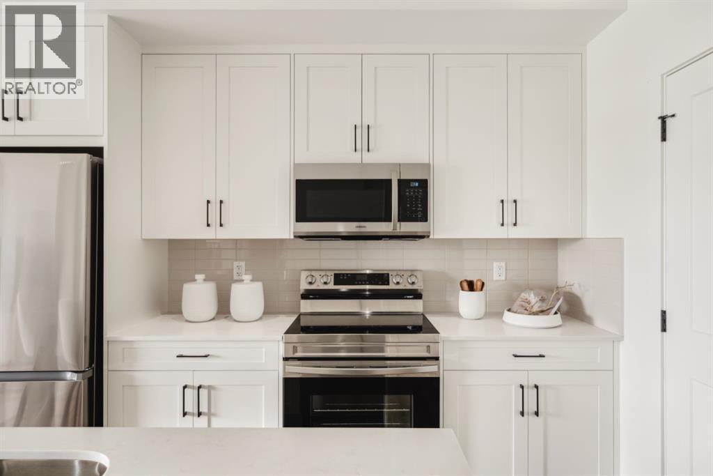119, 20 Cascade Ridge, Canmore, AB - Indoor Photo Showing Kitchen