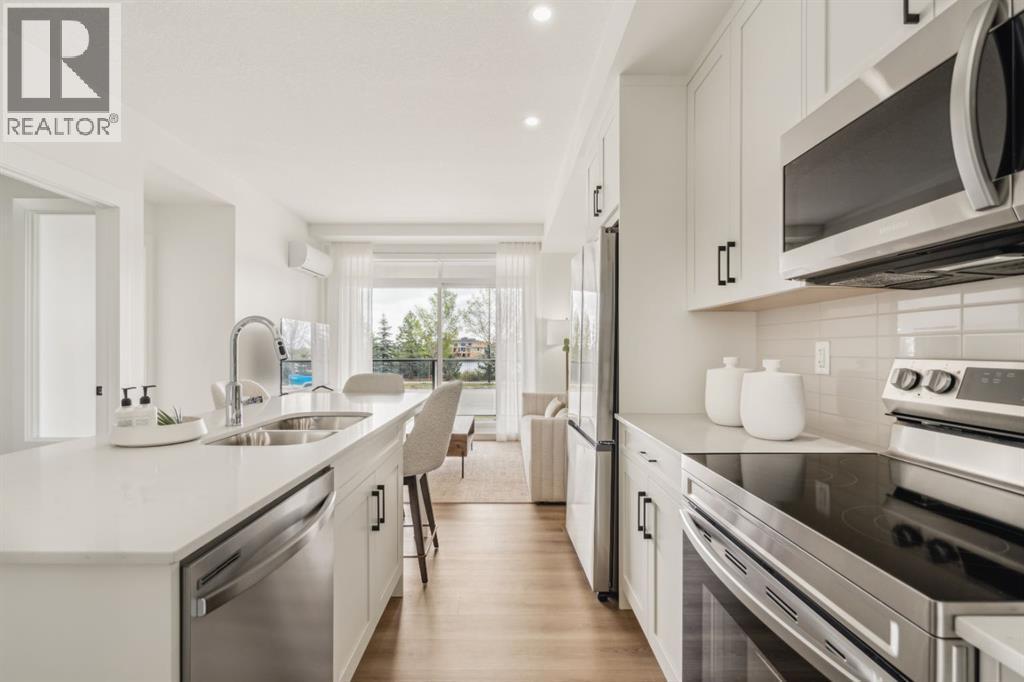 119, 20 Cascade Ridge, Canmore, AB - Indoor Photo Showing Kitchen With Double Sink With Upgraded Kitchen