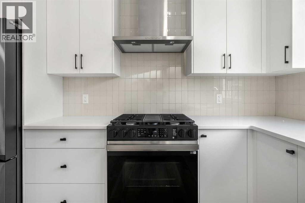 203, 550 Seton Circle Se, Calgary, AB - Indoor Photo Showing Kitchen