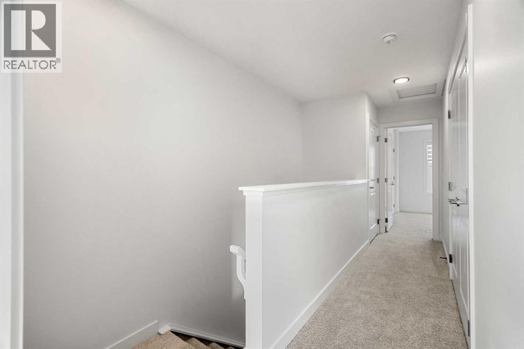 203, 550 Seton Circle Se, Calgary, AB - Indoor Photo Showing Other Room