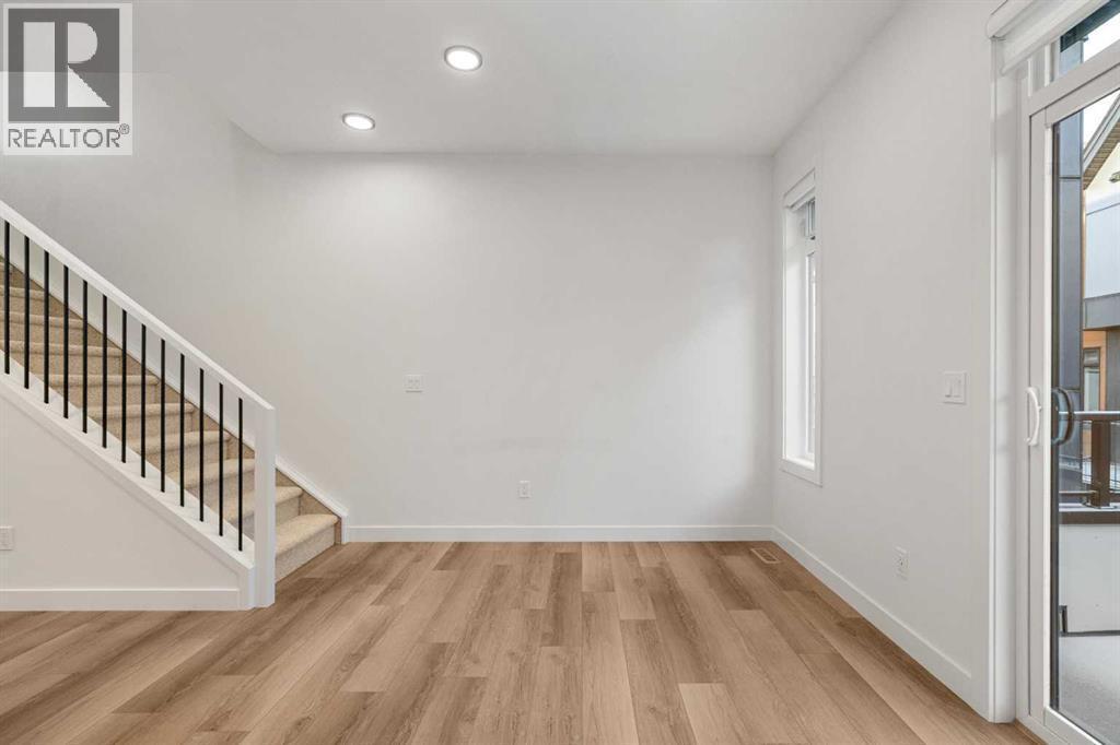 203, 550 Seton Circle Se, Calgary, AB - Indoor Photo Showing Other Room