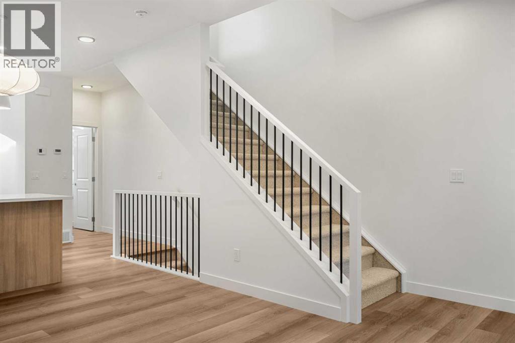 203, 550 Seton Circle Se, Calgary, AB - Indoor Photo Showing Other Room