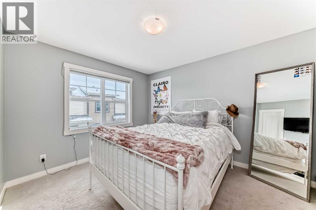 105 Mckenzie Towne Square Se, Calgary, AB - Indoor Photo Showing Bedroom