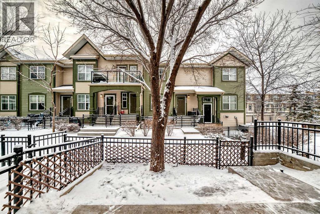 105 Mckenzie Towne Square Se, Calgary, AB - Outdoor With Deck Patio Veranda With Facade