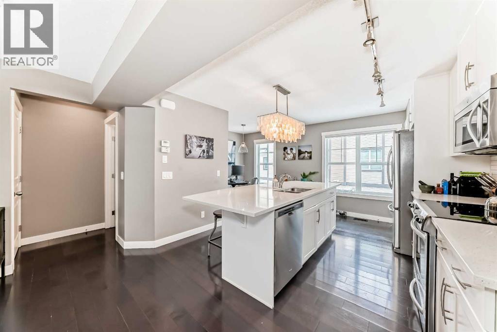 105 Mckenzie Towne Square Se, Calgary, AB - Indoor Photo Showing Kitchen With Stainless Steel Kitchen With Upgraded Kitchen