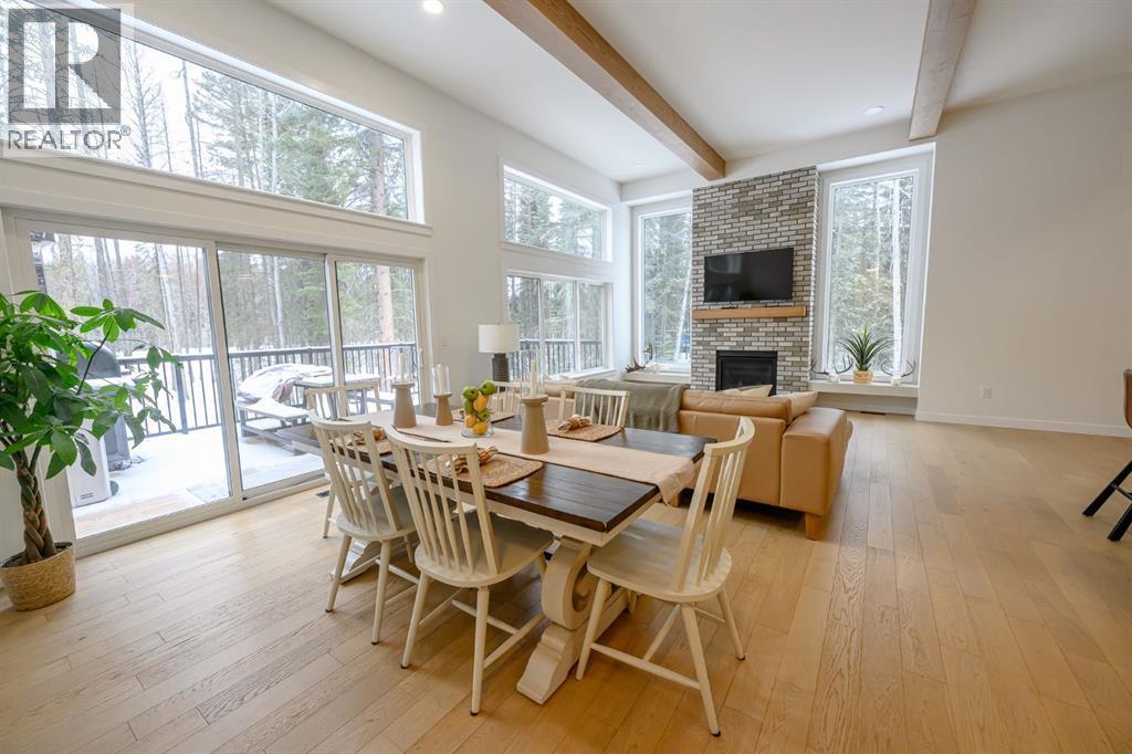 57-704010 64 Range Road, Rural Grande Prairie No. 1, County Of, AB - Indoor Photo Showing Dining Room With Fireplace