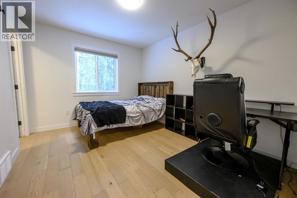 57-704010 64 Range Road, Rural Grande Prairie No. 1, County Of, AB - Indoor Photo Showing Bedroom
