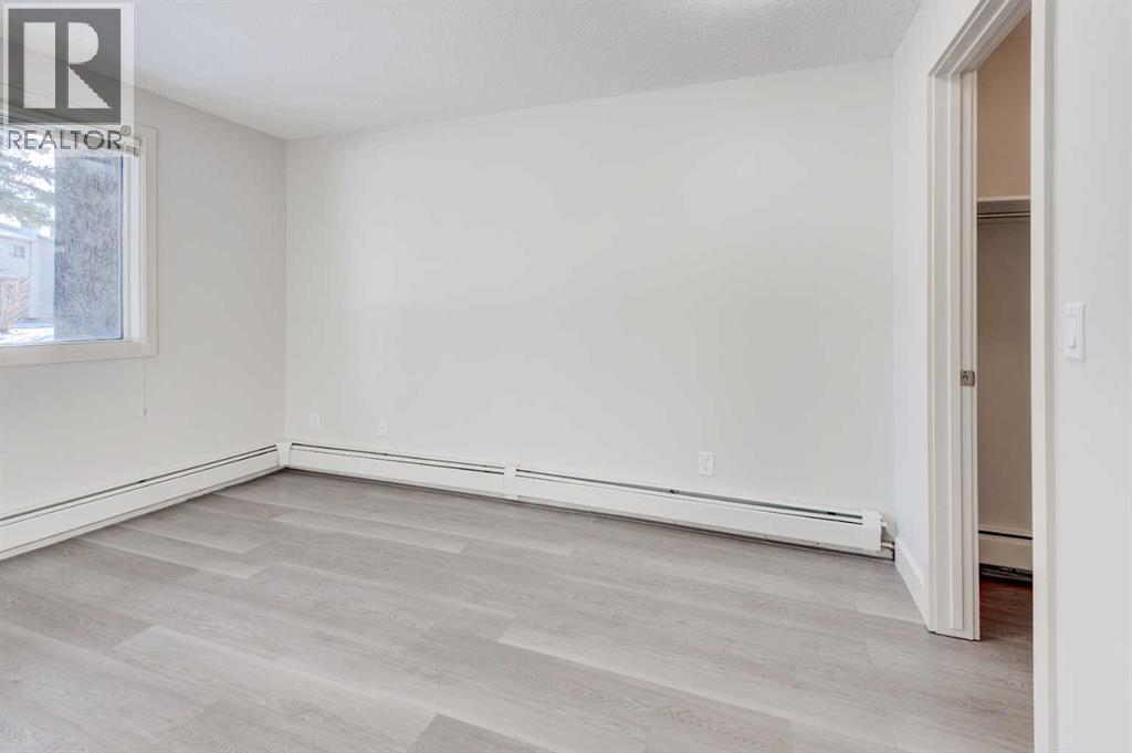 1, 101 Village Heights Sw, Calgary, AB - Indoor Photo Showing Other Room