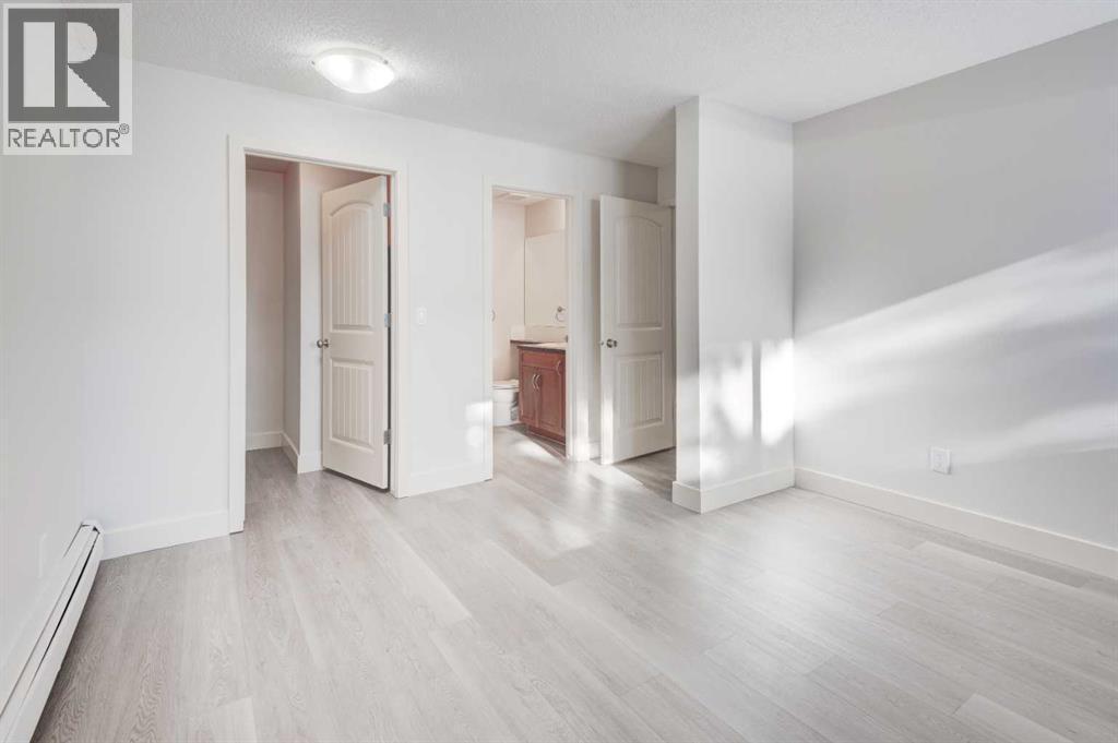 1, 101 Village Heights Sw, Calgary, AB - Indoor Photo Showing Other Room