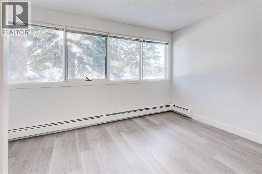 1, 101 Village Heights Sw, Calgary, AB - Indoor Photo Showing Other Room